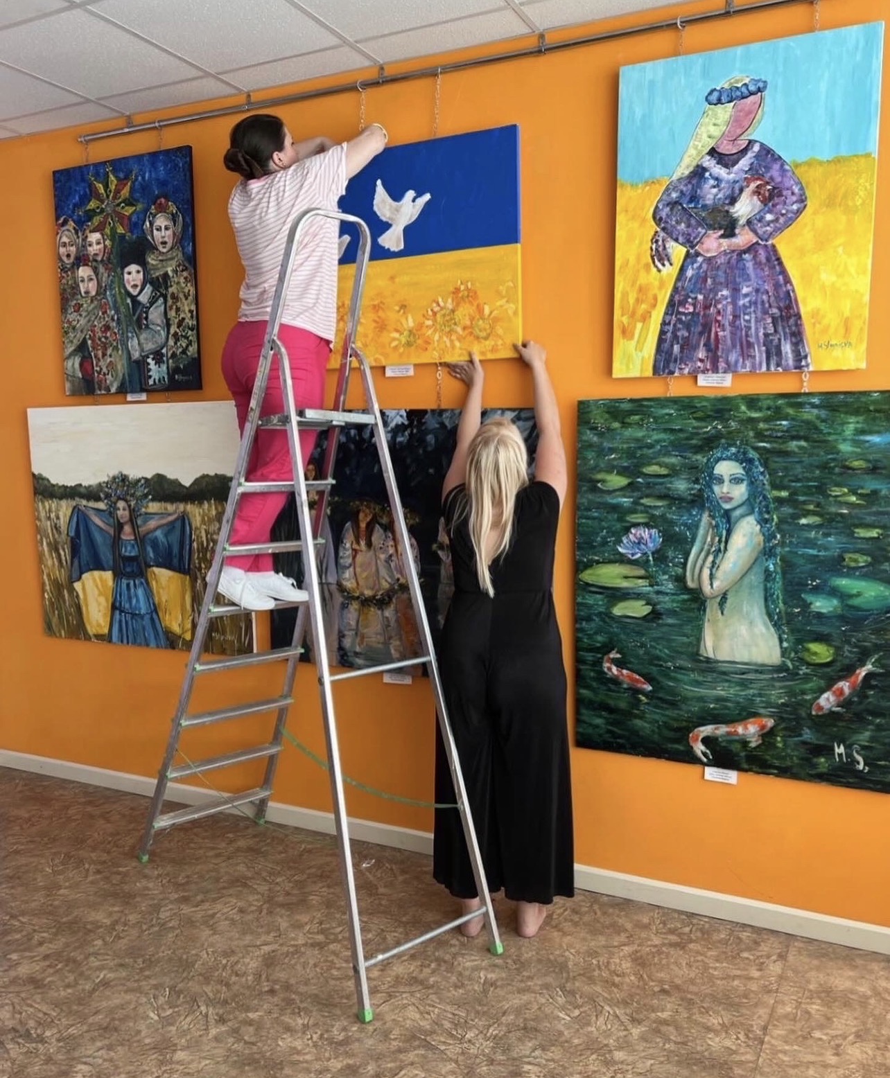 Mavka painting during preparation for Marina Stognieva's personal exhibition, Kyiv, 2022